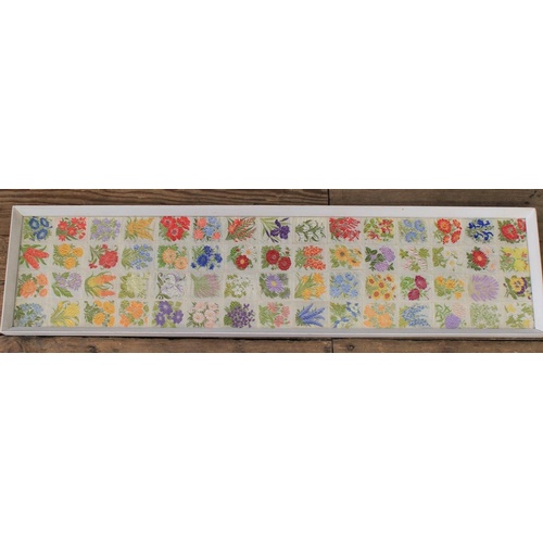 630 - A Beautiful Framed Silk Picture containing 60 various Silks in an Original White Frame. Measures: 35... 