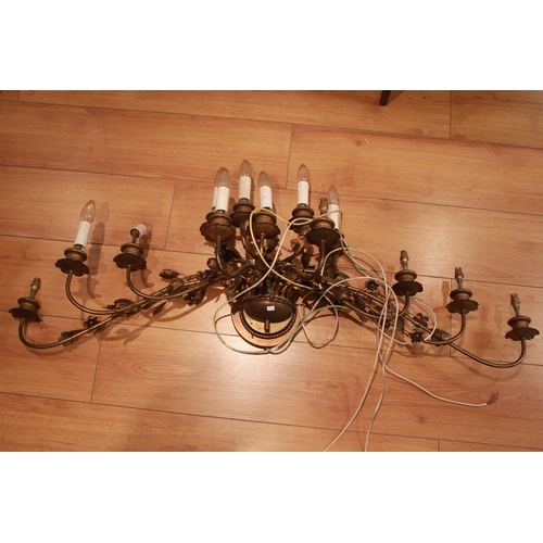 676 - A late 19th century French gilt brass and floral decorated 12 branch light, with candle attachments.