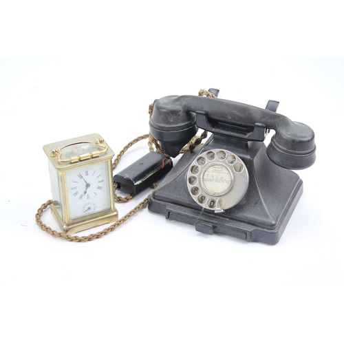 92 - A Brass Cased Carriage Clock and an Original old Telephone.