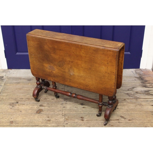 79 - A Victorian mahogany drop flap Sutherland table, resting on twinned turned supports, cross stretcher... 