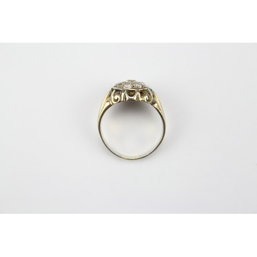 36 - A 9 stone Diamond Dress Ring. Size: P