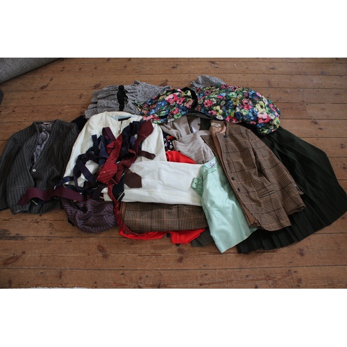 87 - A collection of gentleman's clothing, including blazers, along with a collection of various bags.