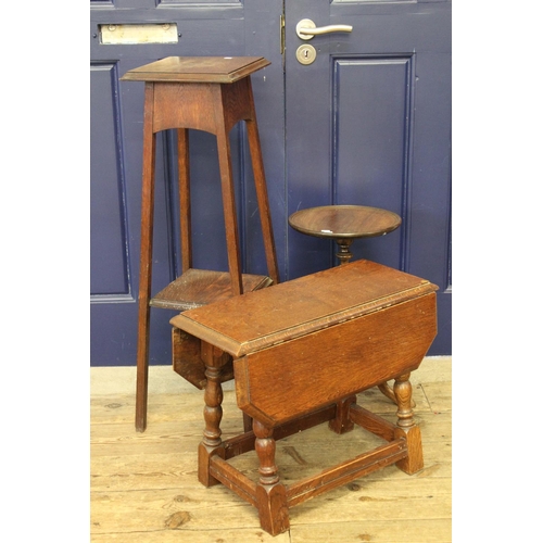 318 - An Oak drop flap coffee table, jardiniere stand and a wine table.