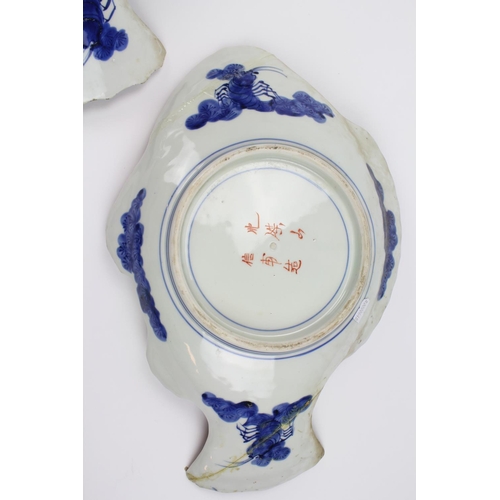 409 - A Pair of Japanese Imari Rust Blue Carp Shaped serving dishes decorated with samurai warriors & atte... 