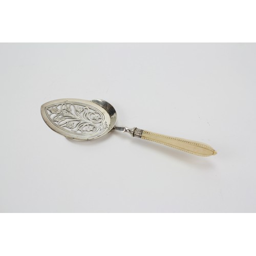 88 - A Victorian silver mounted cake slice with engraved decoration.