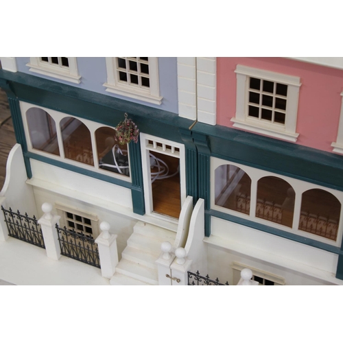 24 - A Large Scratch Built 3 Storey Doll's House designed as a pair of Terrace House/Shop Fronts, Apartme... 
