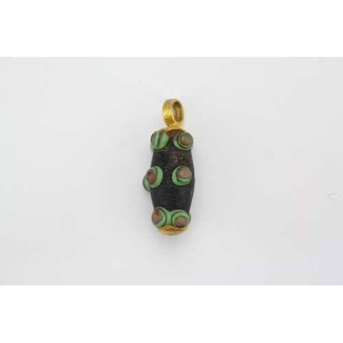 474B - An interesting multicoloured glass bobble beaded mosaic pendant in a gilt gold surrounding.