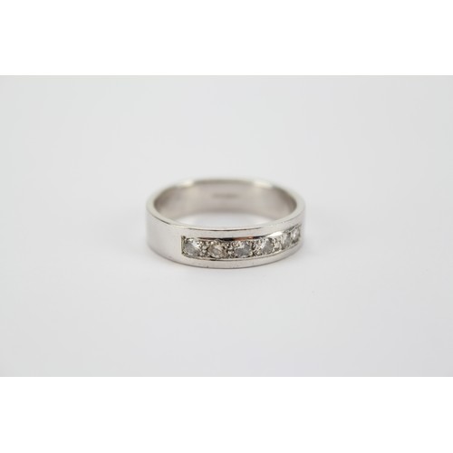 100 - A Gentleman's platinum set diamond dress ring.