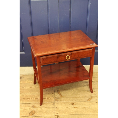 363 - A single drawer mahogany table on swept out legs.