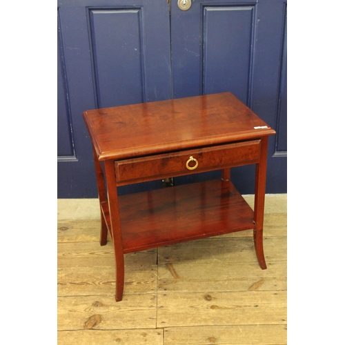 363 - A single drawer mahogany table on swept out legs.