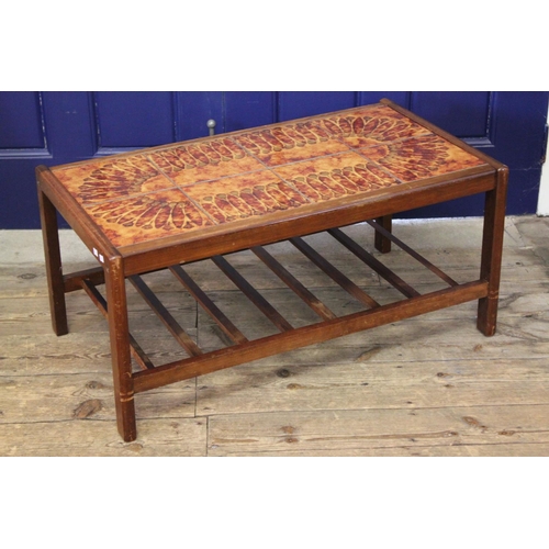 367 - A Scarce 1960's Tile Top table decorated in brown with a floral design.