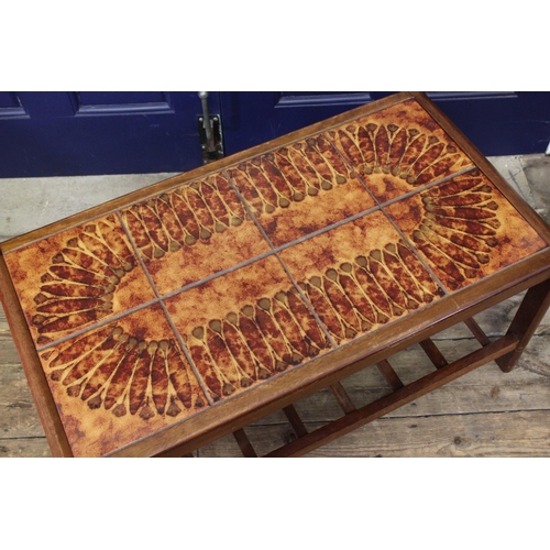 367 - A Scarce 1960's Tile Top table decorated in brown with a floral design.