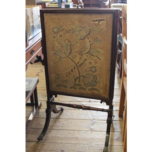 380 - A Regency Mahogany and Ebony Inlaid Three Fold Firescreen on Sabre Legs.