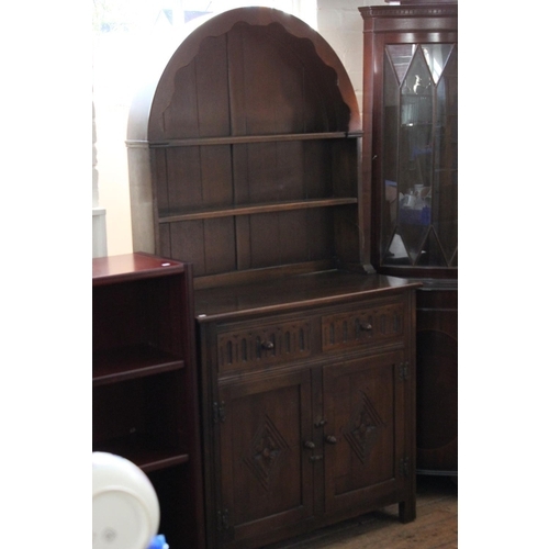 402 - A Reproduction Oak Dresser Fitted Two Drawers, Cupboards and Curved Top. Measuring: 36 inches across... 