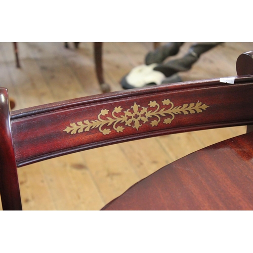 404 - A Round Extendable table with carved edge along with 4 matching chairs with pink covers.