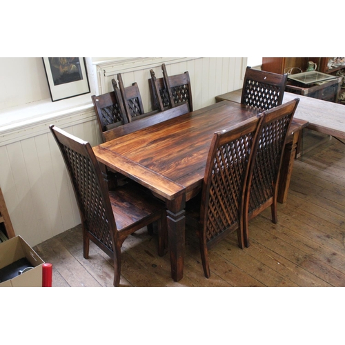 411 - A Lovely Dark Wood Extendable Dining Room Table along with 6 matching Chairs.