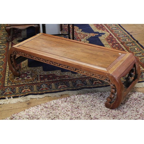 418 - A Chinese Hardwood Opium Table Resting on Carved Supports. Measuring: 48 inches Long x 18.5 inches a... 