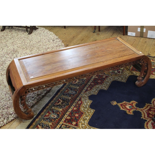 418 - A Chinese Hardwood Opium Table Resting on Carved Supports. Measuring: 48 inches Long x 18.5 inches a... 