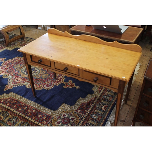 423 - A Victorian Design Satin Wood Three Drawers Side Table Resting on Square Feet and Turned Mahogany Ha... 