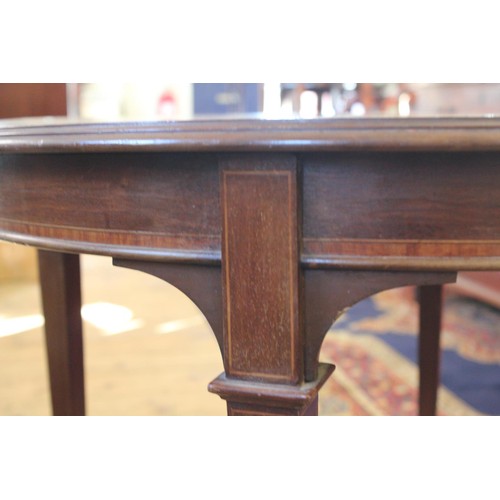 447 - A Victorian Mahogany & Satin Wood inlaid Circular Topped Drawing Room Table with Cross Stretcher.