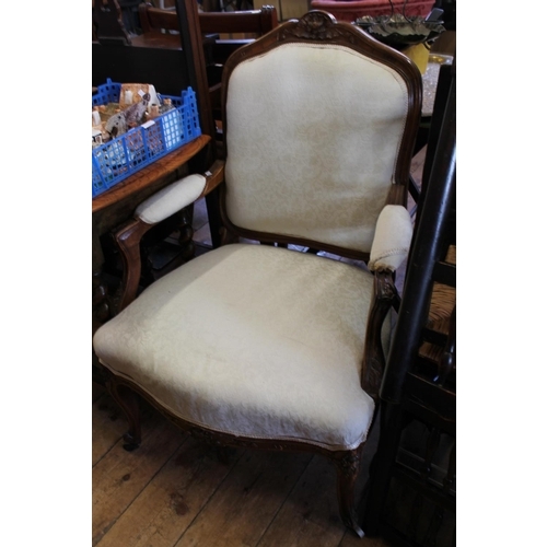 451 - A French Walnut Carved Back & Padded Arms Fauteuil covered in White Linen.