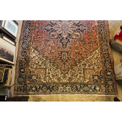 333 - An Antique Rust Blue floral bordered central medallion all over patterned Persian carpet. Measuring ... 