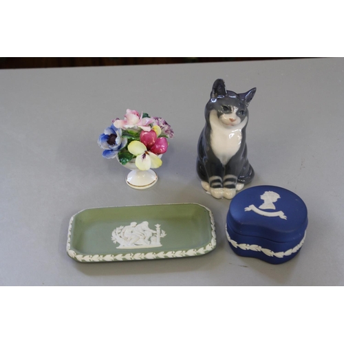 545 - A Royal Copenhagen study in Blue of a seated cat, Number 1803 along with a wedgwood pin dish & other... 