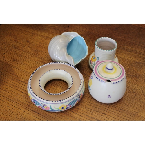 556 - A Poole Pottery Shell Dish, a Posy Ring and a Marmalade Jar.