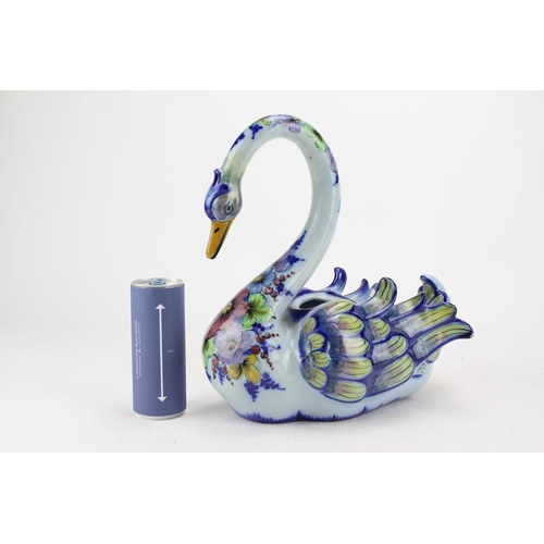 575 - A Modern Pottery Majolica Decorated Plant Holder Designed as a Goose.