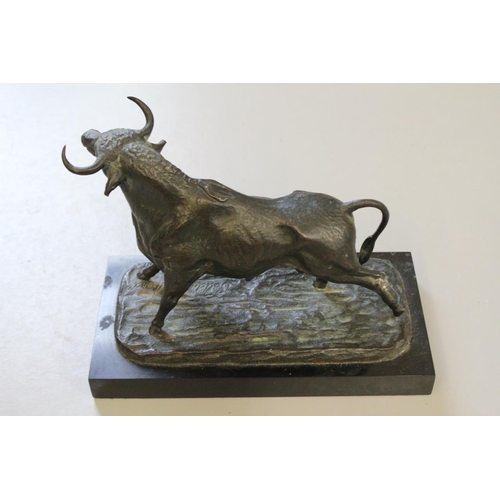 673 - A Bronzed Study of a Bull on a Marble Base Signed.