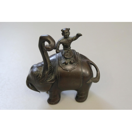 674 - Chinese Bronze Study of an Elephant with a Young Attendant Banging Drums.