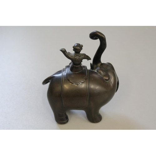 674 - Chinese Bronze Study of an Elephant with a Young Attendant Banging Drums.