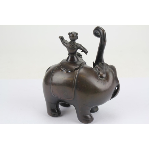 674 - Chinese Bronze Study of an Elephant with a Young Attendant Banging Drums.