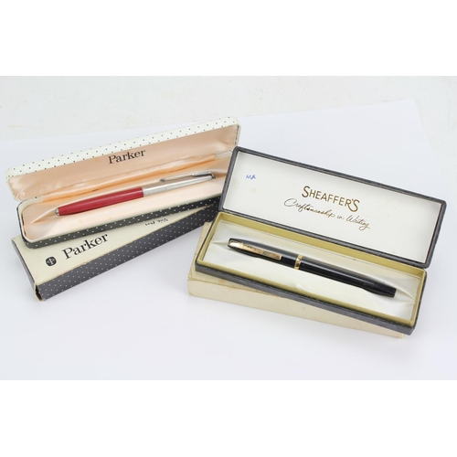 332 - A Sheaffer's pen made in Australia, gold coloured and banded, with cartridge filling, along with a P... 