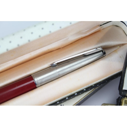 332 - A Sheaffer's pen made in Australia, gold coloured and banded, with cartridge filling, along with a P... 