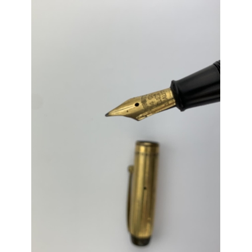 331 - A Conway Stewart 18ct Rolled Gold Dinkie Fountain Pen.