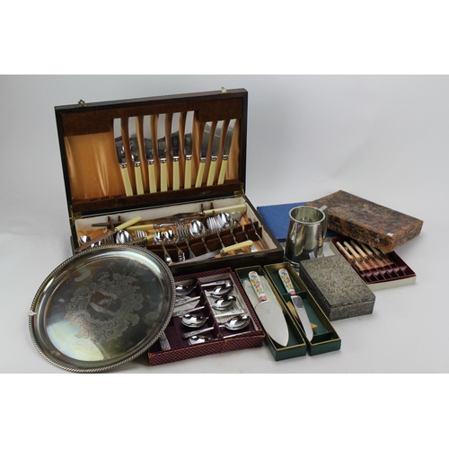 87 - A quantity of cased cutlery including a Canteen, Cigarette Box, Salver, etc.