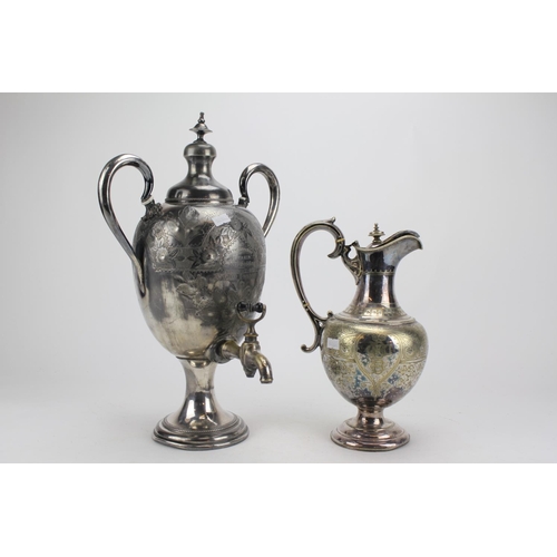 81 - A Silver Plated and Engraved Claret Jug and Electro Plated Tea Urn on Base.