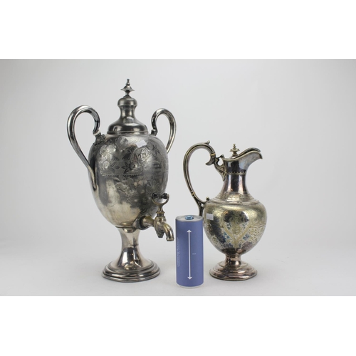 81 - A Silver Plated and Engraved Claret Jug and Electro Plated Tea Urn on Base.