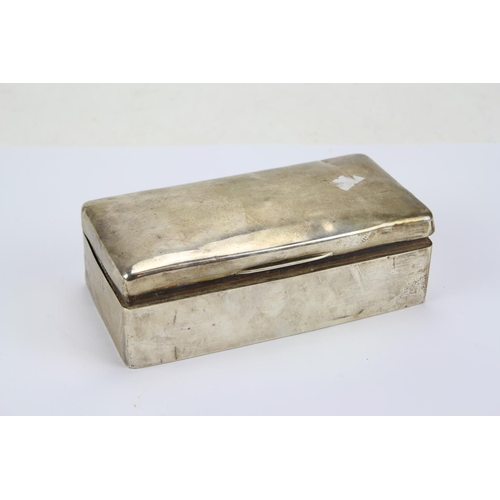 65 - A Silver Mounted Cigarette Box with a Sandalwood Liner.