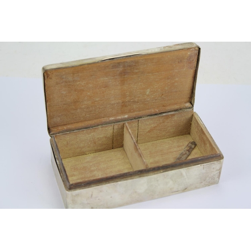 65 - A Silver Mounted Cigarette Box with a Sandalwood Liner.