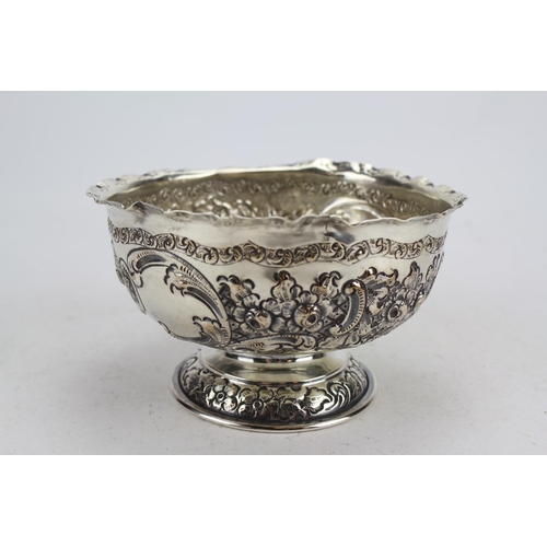 66 - A Victorian Silver Rose Bowl with Embossed Decoration Resting on Pedestal Base, London C. Weighing 2... 