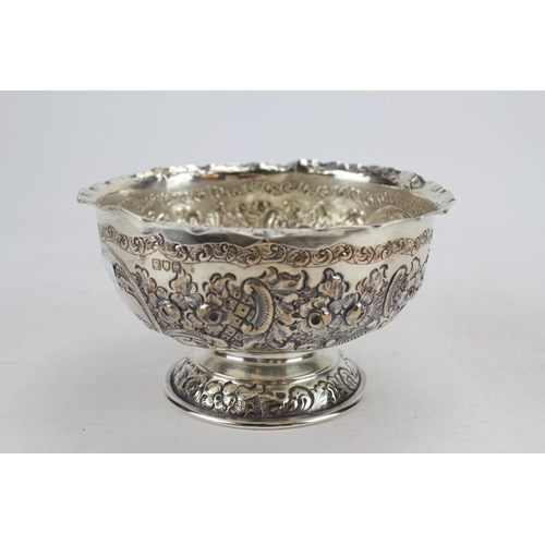 66 - A Victorian Silver Rose Bowl with Embossed Decoration Resting on Pedestal Base, London C. Weighing 2... 