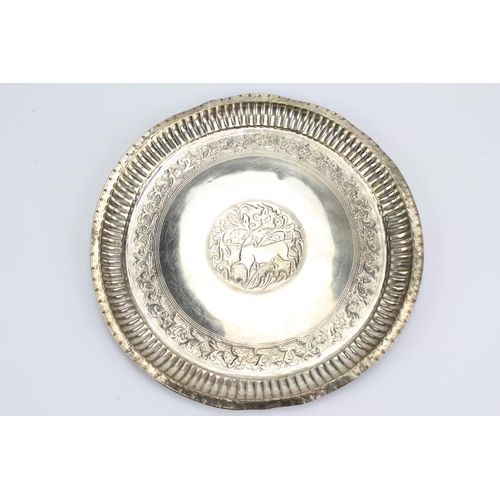 67 - A Sino-Indian Embossed Silver Coloured White Metal Salver Decorated with a Deer. 223 Grams.