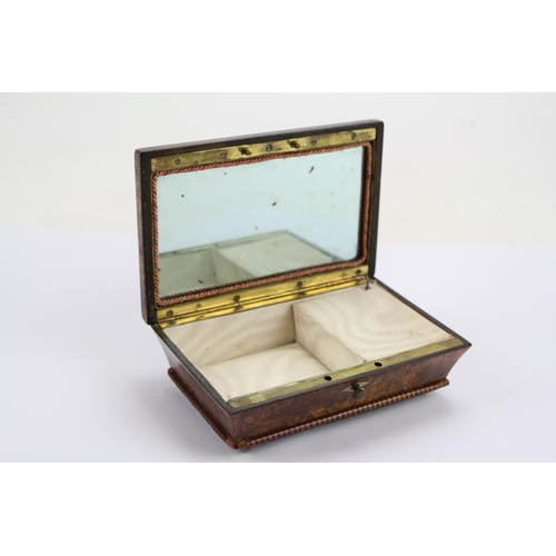 713 - A Late 19th Century Burr Walnut & inlaid Regency design Music Box with fitted interior & Mother of P... 