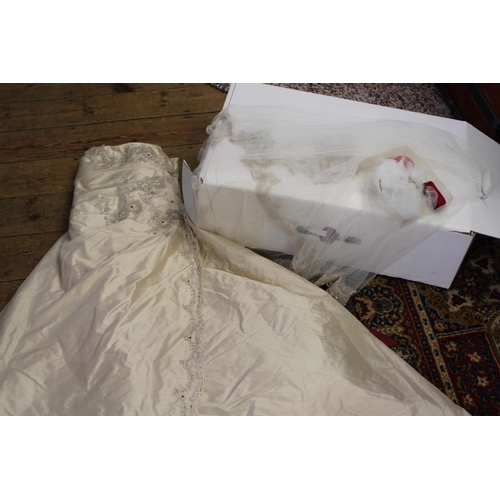 338 - A Ladies Crushed Silk Embroidered Pearl and Glass Set Wedding Dress with Train in Original Box.