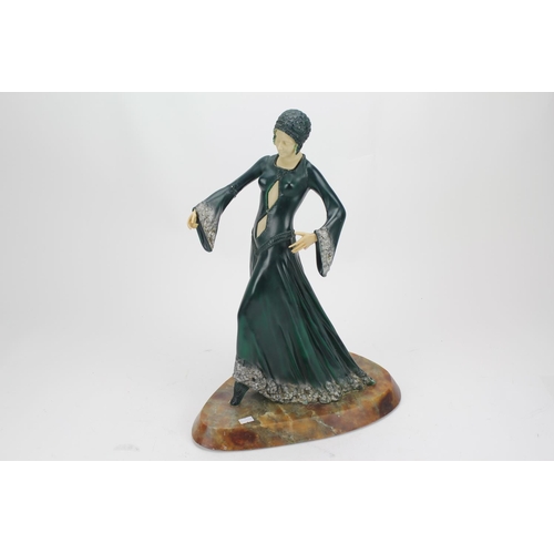 479 - An Art Deco style Resin study of a young lady. Standing: 47cms High.