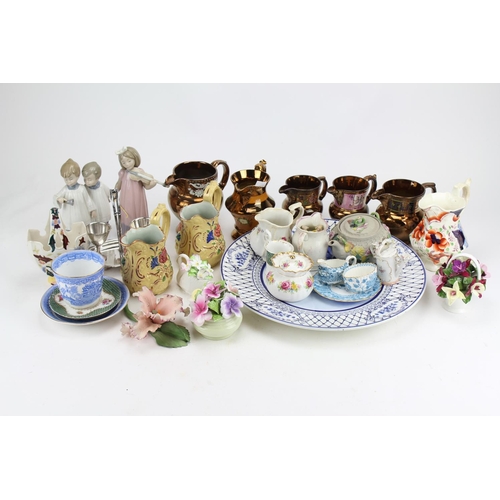 488 - Copper Lustre Jugs, Spanish Figures of Children, Part Tea Sets and Flower Ornaments.