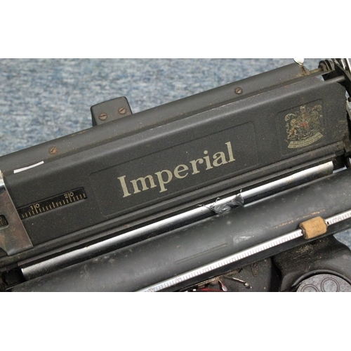 518 - An Imperial Type Writer Top Column Shift U Base in Black Enamelled Case.