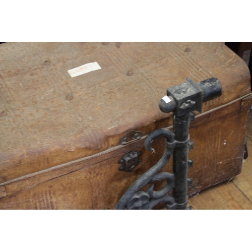 520 - A Late 19th Century Wrought Iron Entrance Hall Lamp Holder and a Tin Cabin Trunk.